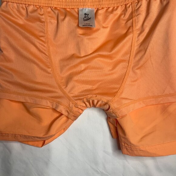Art class mid-thigh length orange Size L (10/12). Made in Vietnam. 100% Nylon. - Picture 3 of 7